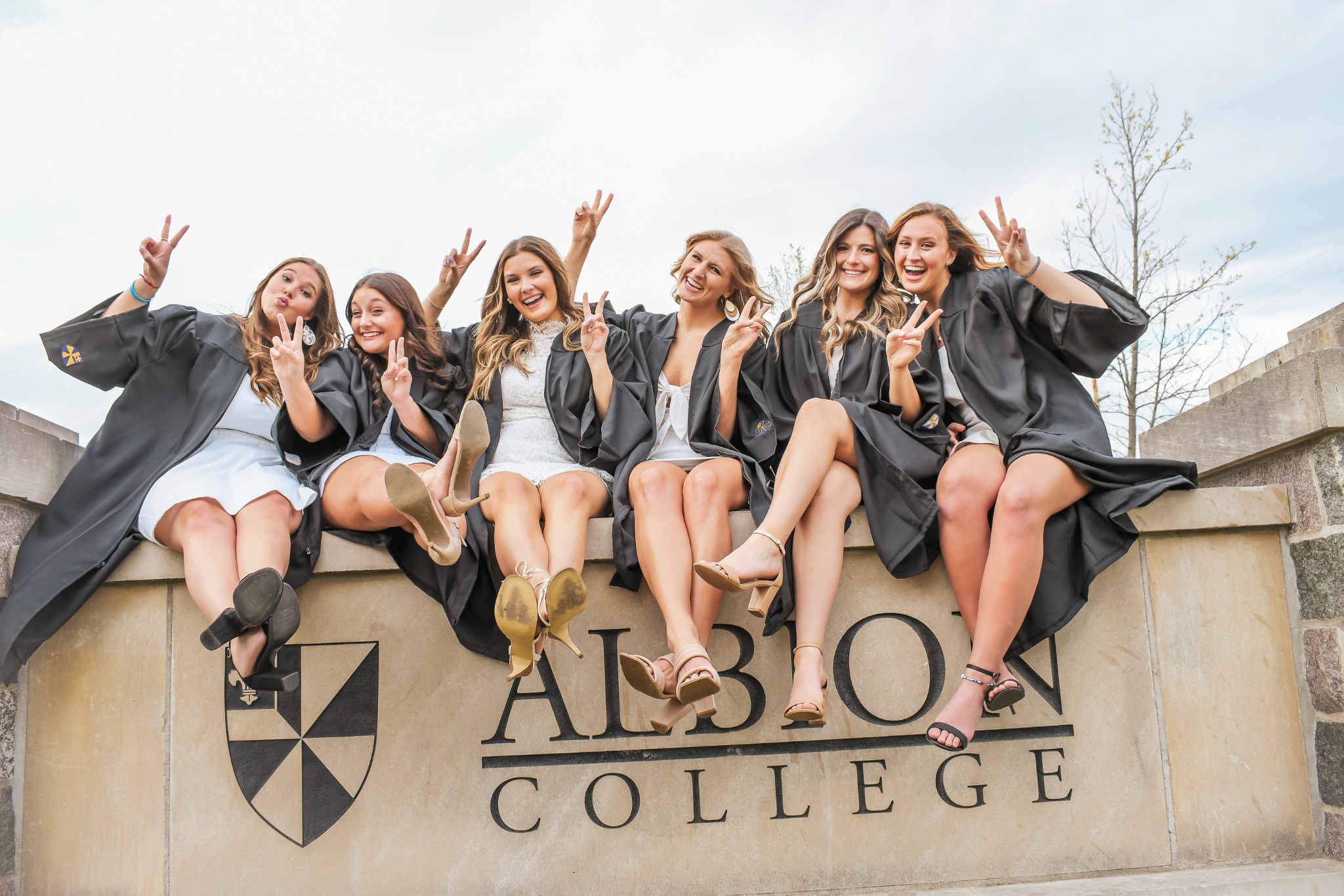 Albion graduates celebrating together on campus